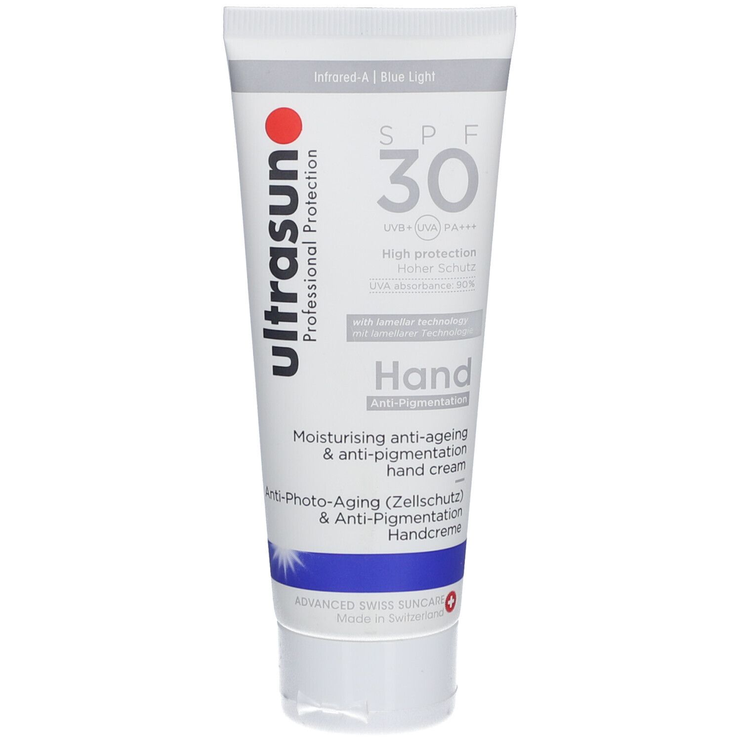 Tube blanc avec point rouge et texte Ultrasun. SPF 30, crème pour les mains anti-pigmentation.