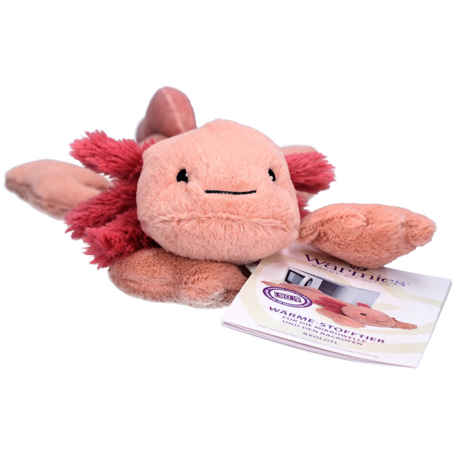Roze axolotl knuffel met rode kieuwen. Naast een brochure met productafbeelding.