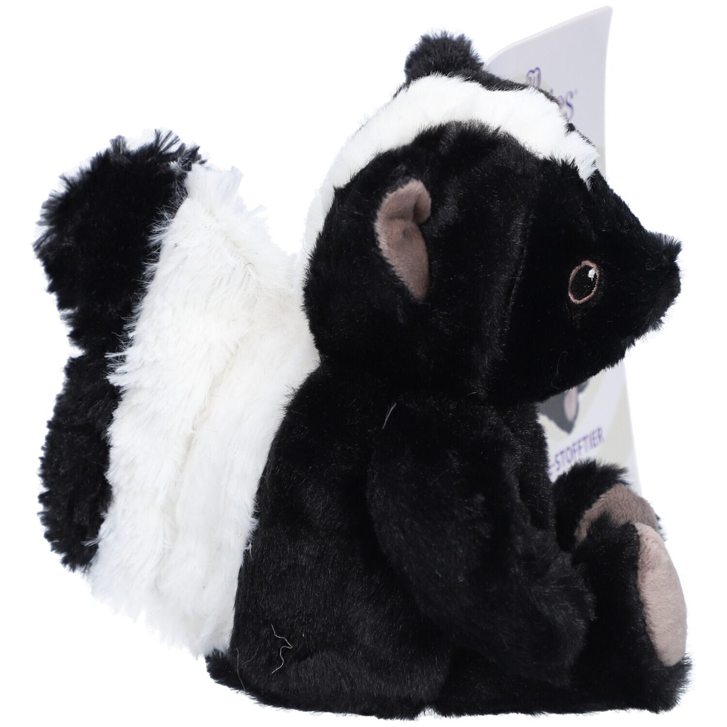 Peluche mouffette noire avec une rayure blanche sur la tête et une queue touffue noire et blanche.