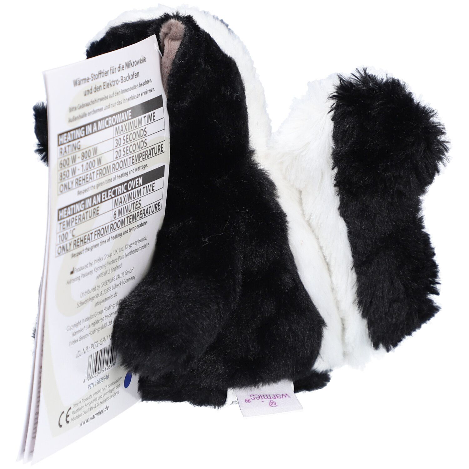 Moufette en peluche avec étiquette indiquant les informations de chauffage pour micro-ondes et four.