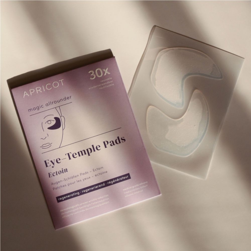 Paquet de coussinets pour les yeux et les tempes et coussinets. Marque APRICOT. 30 coussinets. Emballage violet et coussinets transparents.