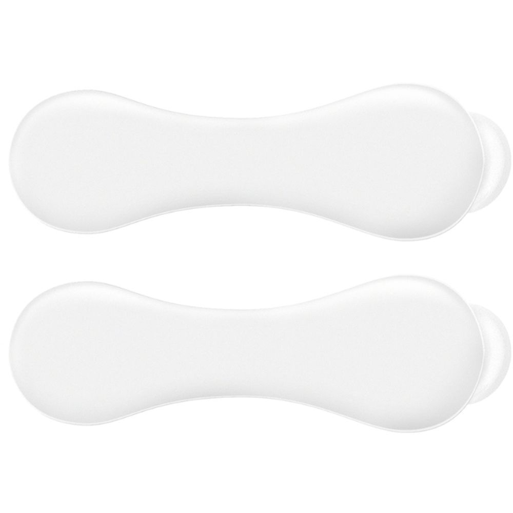 Twee witte, ovale mondpads. Ze hebben een smalle, langwerpige vorm met afgeronde uiteinden.
