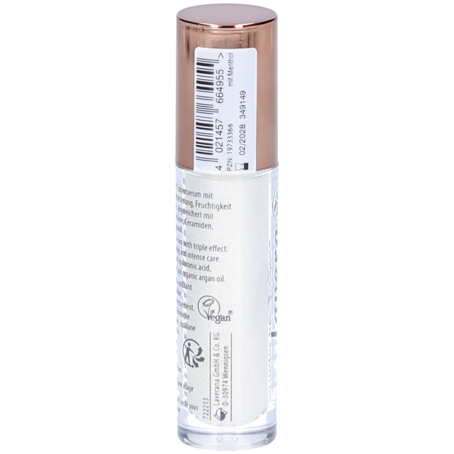 Flacon d'élixir pour les lèvres avec bouchon or rose. Inscription : ingrédients, code-barres, label vegan.