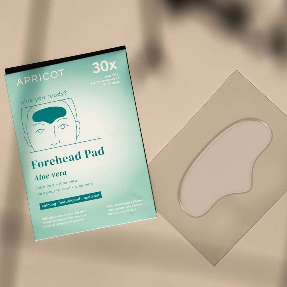 Emballage et Forehead Pad. Marque APRICOT. Texte : Forehead Pad Aloe vera. 30x. Réutilisable.