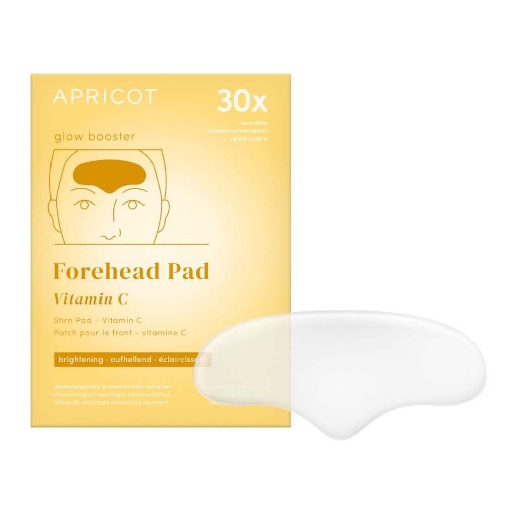 Voorhoofdpad met vitamine C. Verpakking en pad. Geel-witte verpakking, pad ernaast. Tekst: APRICOT, Forehead Pad, 30x.