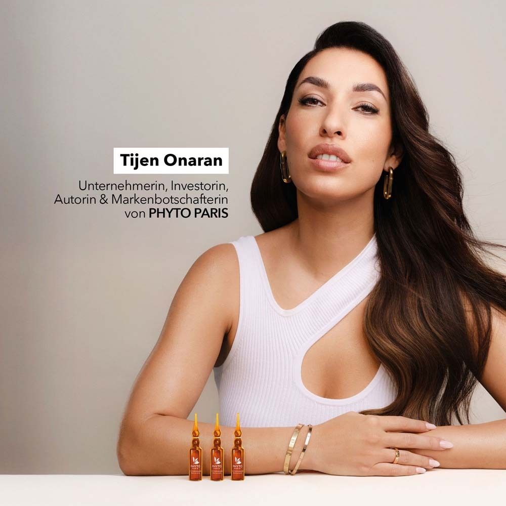 Vrouw met lang bruin haar. Tekst: Tijen Onaran, ondernemer, investeerder, auteur & merkambassadeur van PHYTO PARIS. Ampullen.