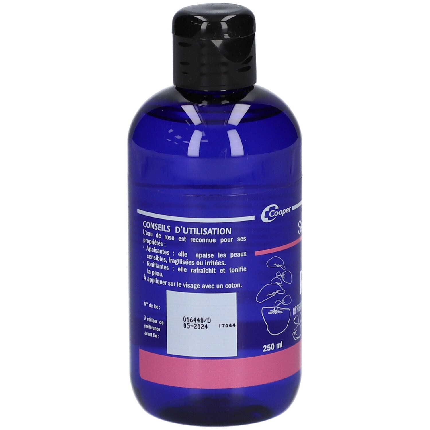 Flacon bleu avec bouchon noir. Inscription "Conseils d'utilisation". Étiquette avec texte et bande rose. 250 ml.