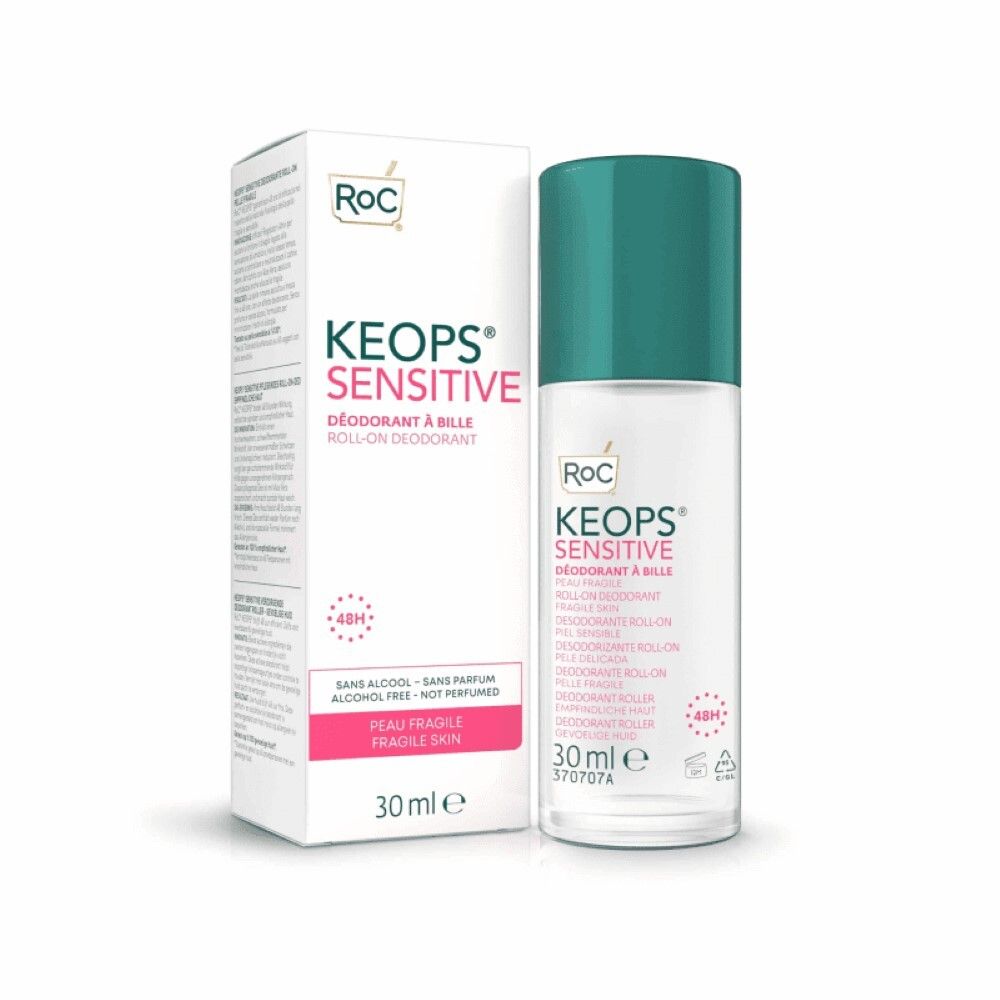 Roll-on deodorant en verpakking. Witte roll-on met groene dop. Opschrift: KEOPS Sensitive, 30 ml. Verpakking met logo en productinformatie.