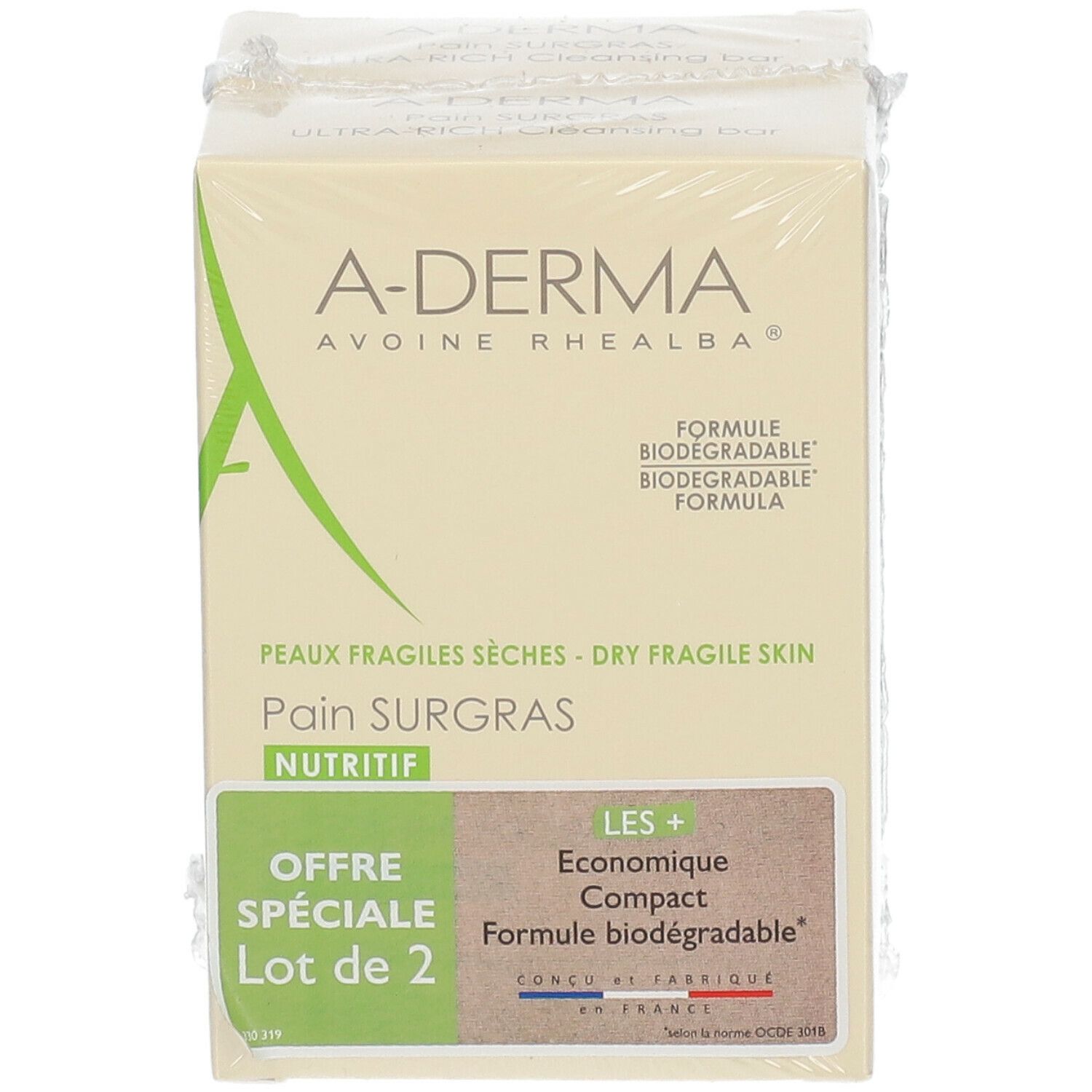Emballage sous film A-Derma. Inscriptions : "Offre Spéciale Lot de 2", "Pain Surgras Nutritif", et "Formule biodégradable".