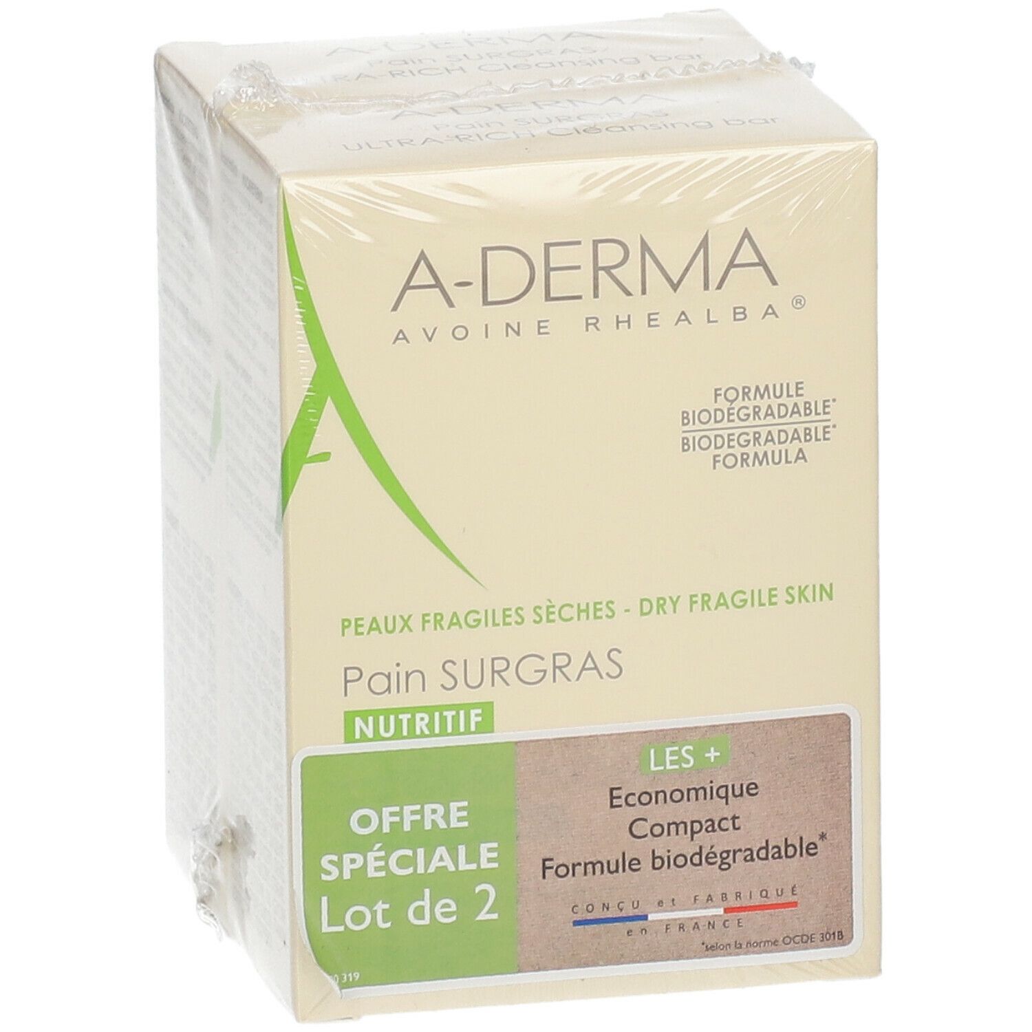 Emballage sous film A-Derma. Inscriptions : "Offre Spéciale Lot de 2", "Pain Surgras Nutritif", et "Formule biodégradable".