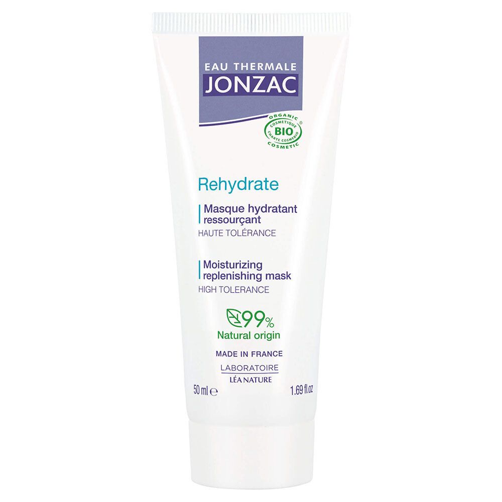 Witte tube met blauwe dop. Opschrift: Eau Thermale Jonzac, Rehydrate, 99% Natural origin. Bio-certificering.