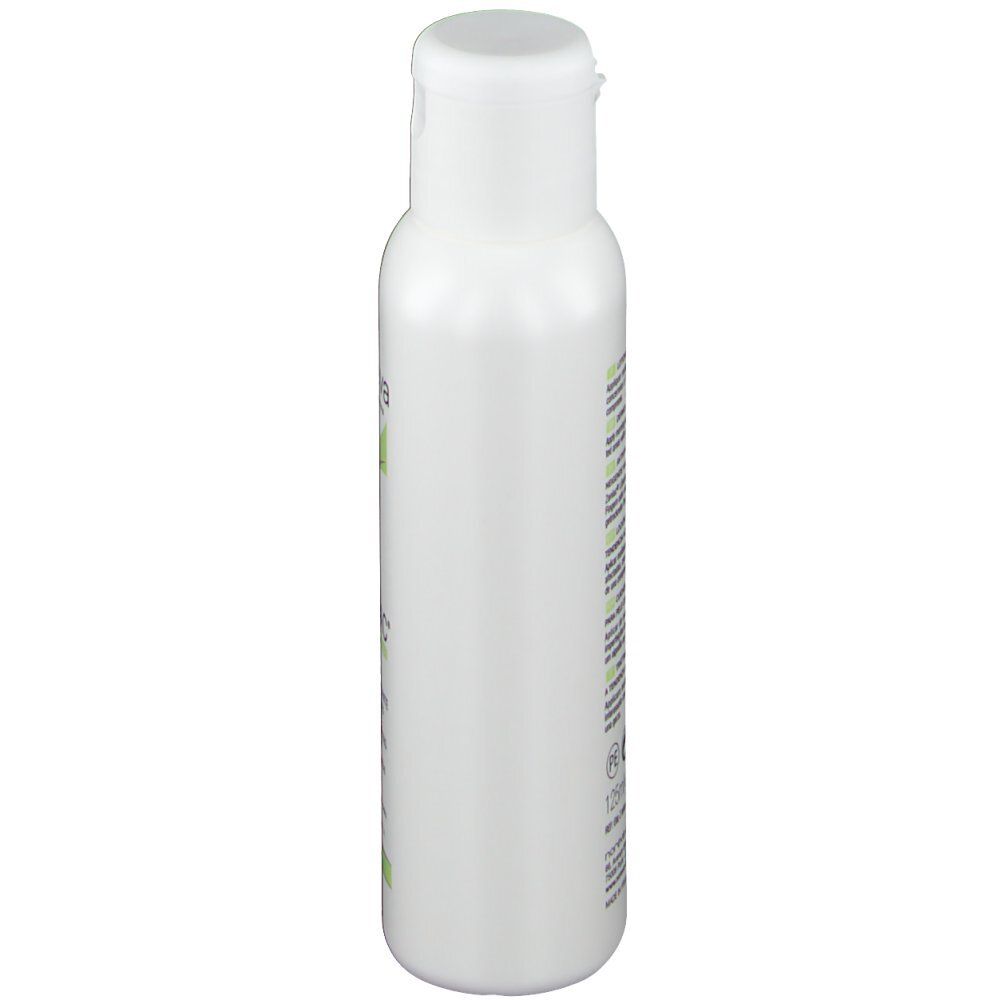 Witte fles met klapdeksel. Opschrift niet zichtbaar.