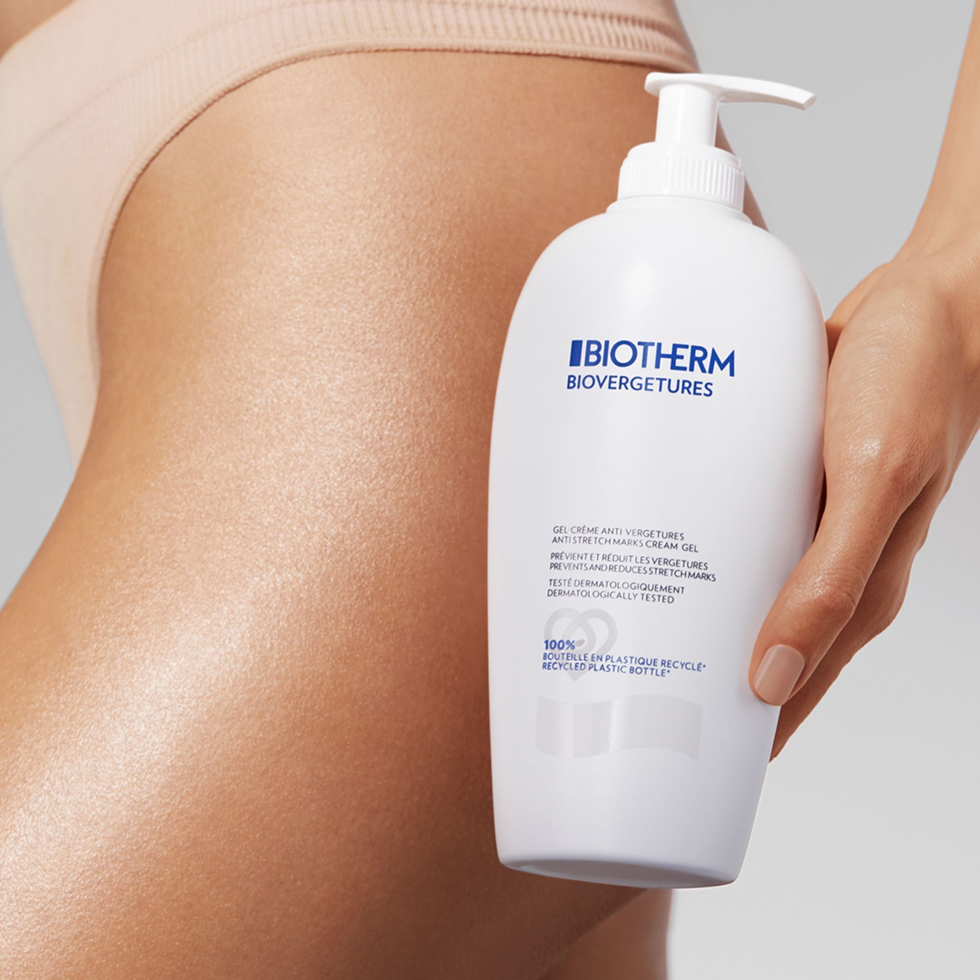 Witte fles met pomp. Productnaam: BIOVERGETURES. Tekst: gel-crème anti-vergetures.