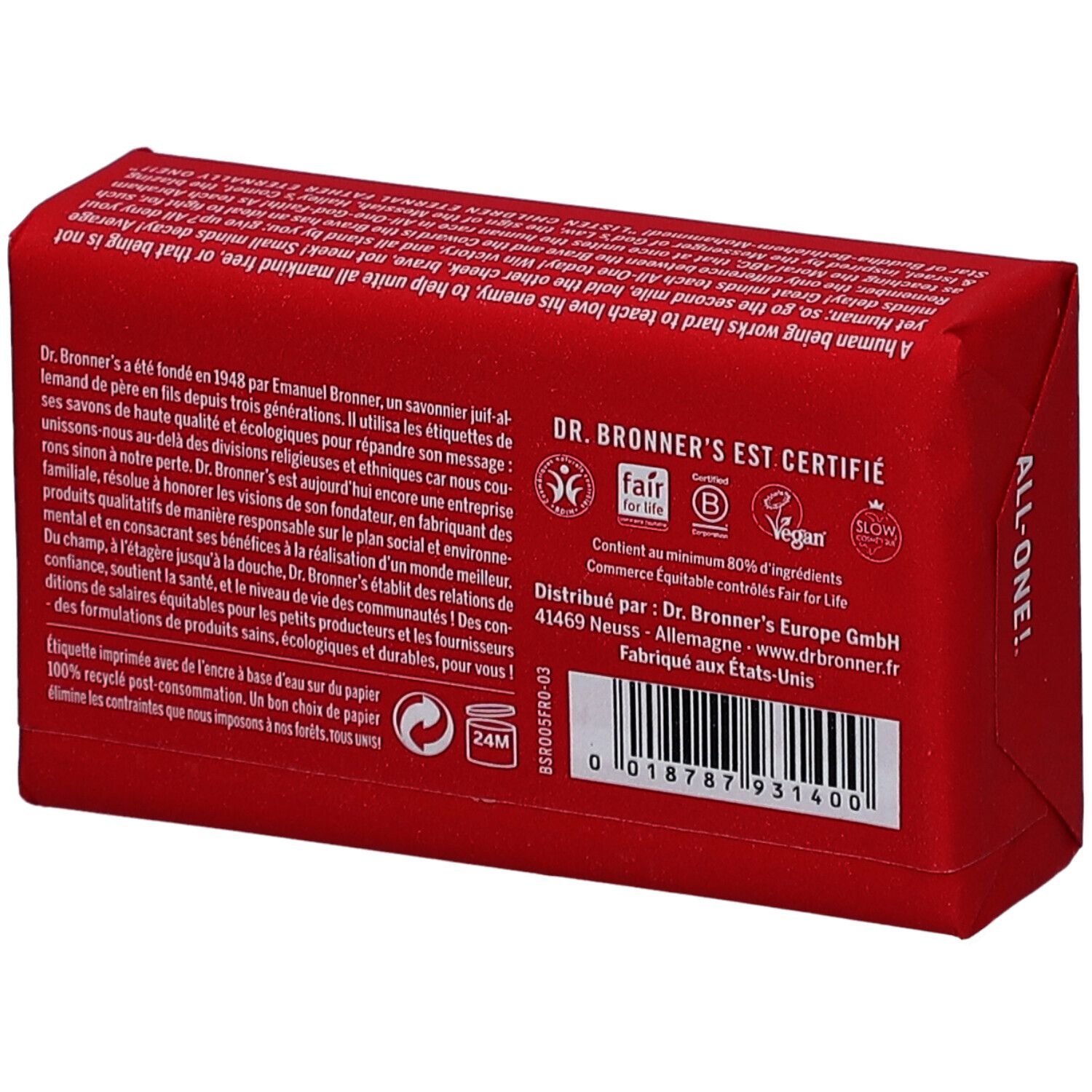 Roze zeep in verpakking. Opschrift: DR. BRONNER'S. Achterkant met tekst en logo's.