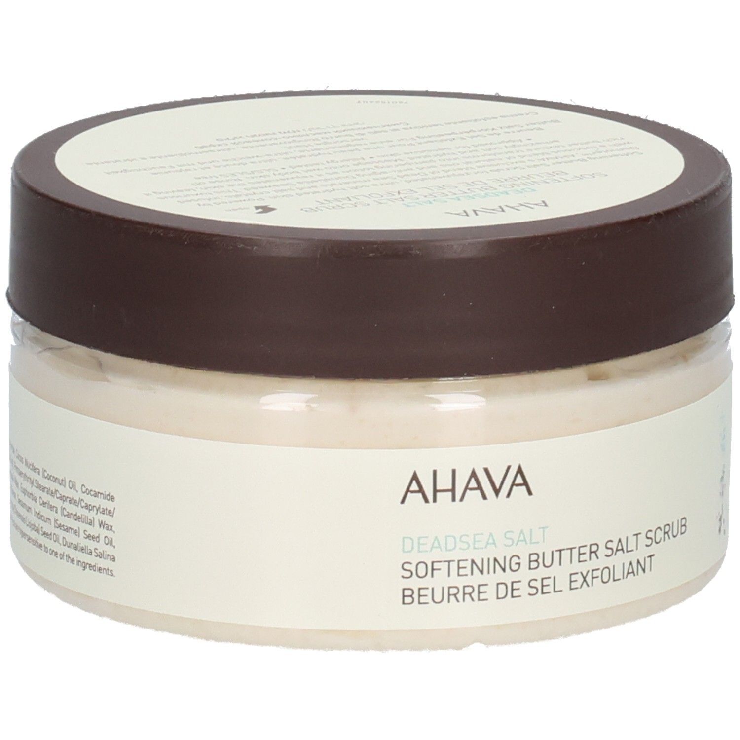 Ahava-product. Ronde, transparante pot met bruin deksel. Opschrift: AHAVA, Deadsea Salt, Softening Butter Salt Scrub, Beurre de Sel Exfoliant.