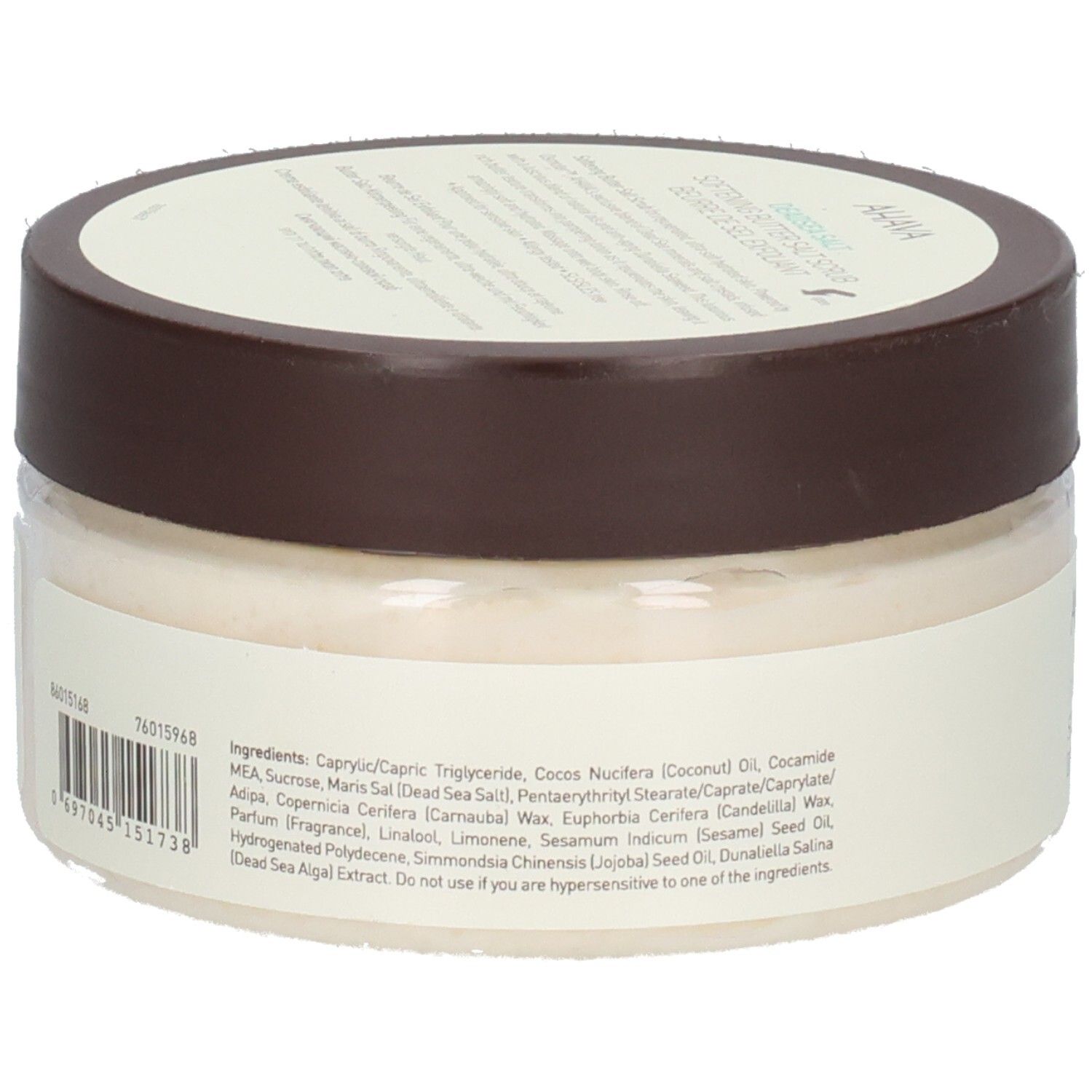 Achterkant van het Ahava-product. Transparante pot met bruin deksel. Opschrift: ingrediëntenlijst, barcode, fabrikantinfo.