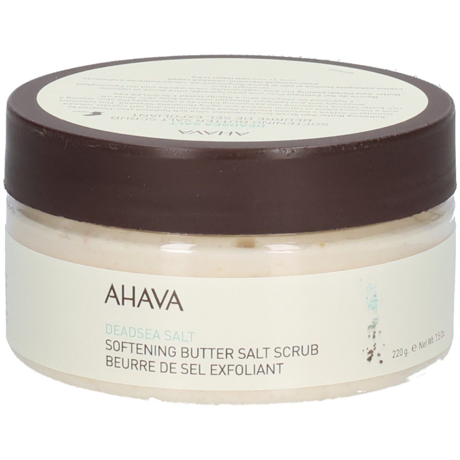 Ahava-product. Ronde, transparante pot met bruin deksel. Opschrift: AHAVA, Deadsea Salt, Softening Butter Salt Scrub, Beurre de Sel Exfoliant, 220g.