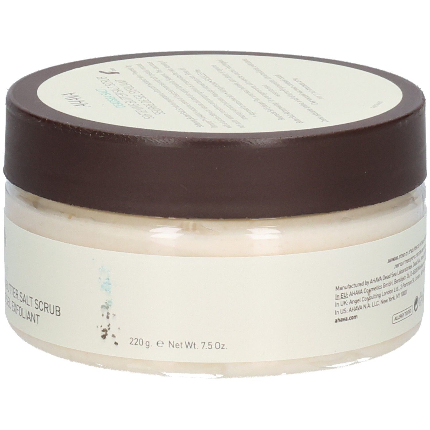 Achteraanzicht van het Ahava-product. Transparante pot met bruin deksel. Opschrift: fabrikantinfo, 220 g, 7.5 Oz.