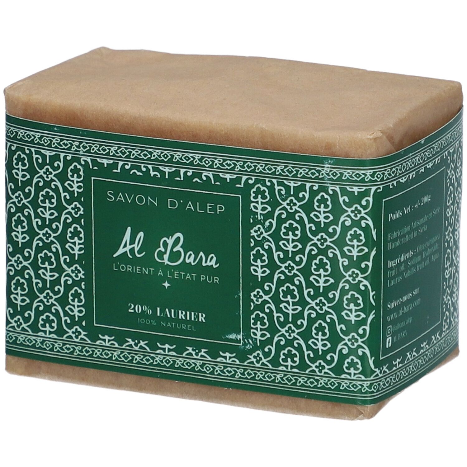 Zeep verpakt in papier. Groene band met bloemmotieven en tekst: Savon d'Alep, Al Bara, 20% Laurier.