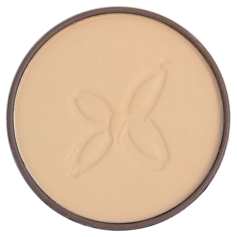Poudre compacte beige clair. Forme ronde. Motif papillon en relief sur la surface. Bord marron.