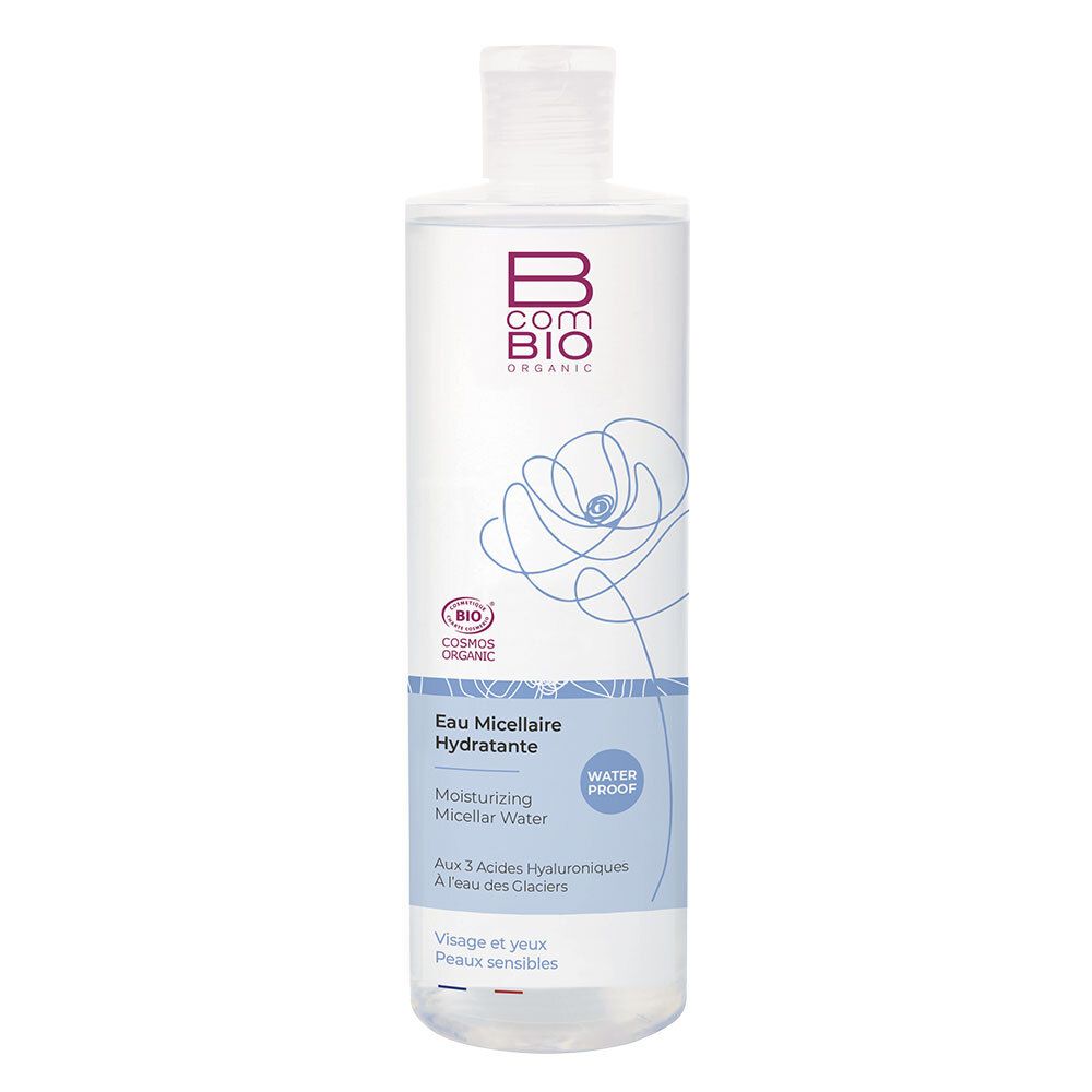 Flacon transparent avec bouchon blanc. Inscription: B COM BIO, Eau Micellaire Hydratante. Certification COSMOS ORGANIC.