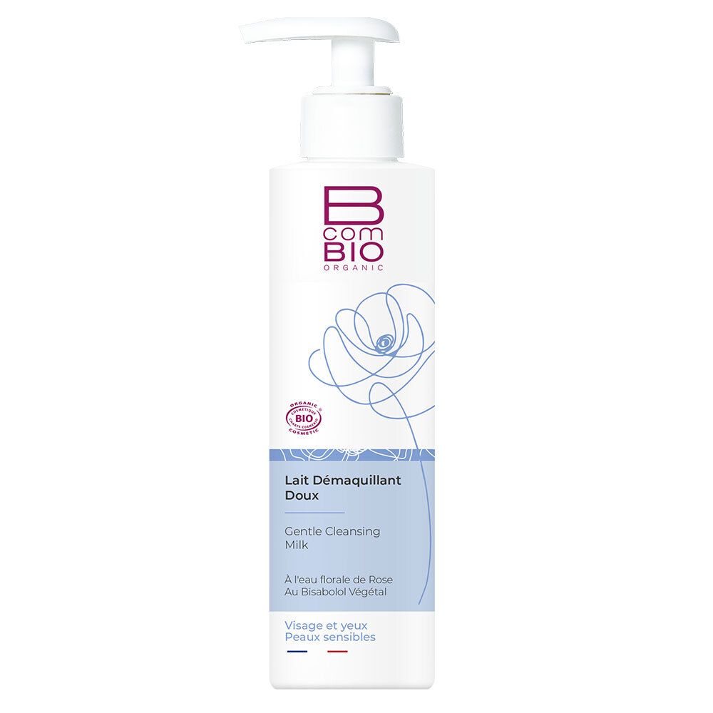 Flacon blanc avec pompe. Inscription: B COM BIO ORGANIC, Lait Démaquillant Doux, Gentle Cleansing Milk. Certification bio.