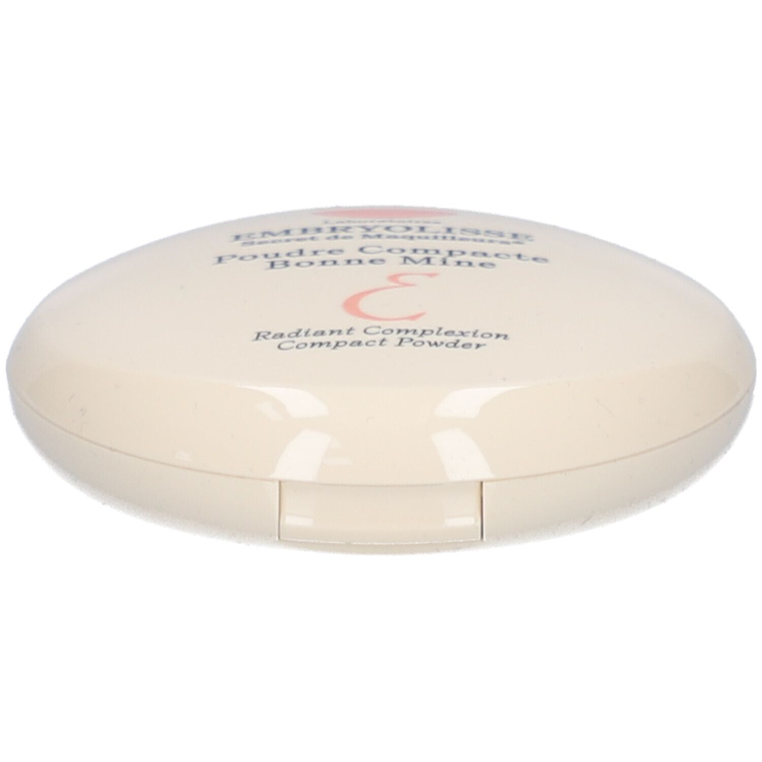 Ovale compactpoederdoos, crème. Opschrift: EMBRYOLISSE, Poudre Compacte Bonne Mine. Roze logo.