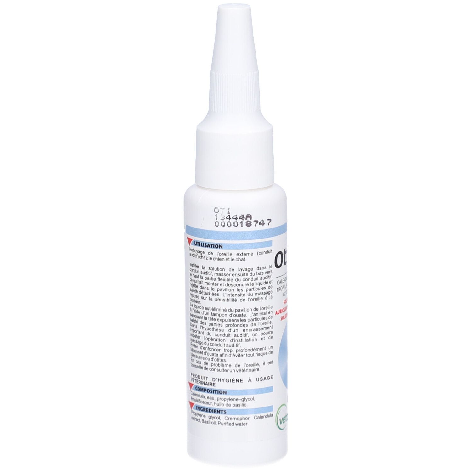 Witte fles met puntige applicator. Blauwe en rode tekst. Tekst: Otifree, ingrediënten.