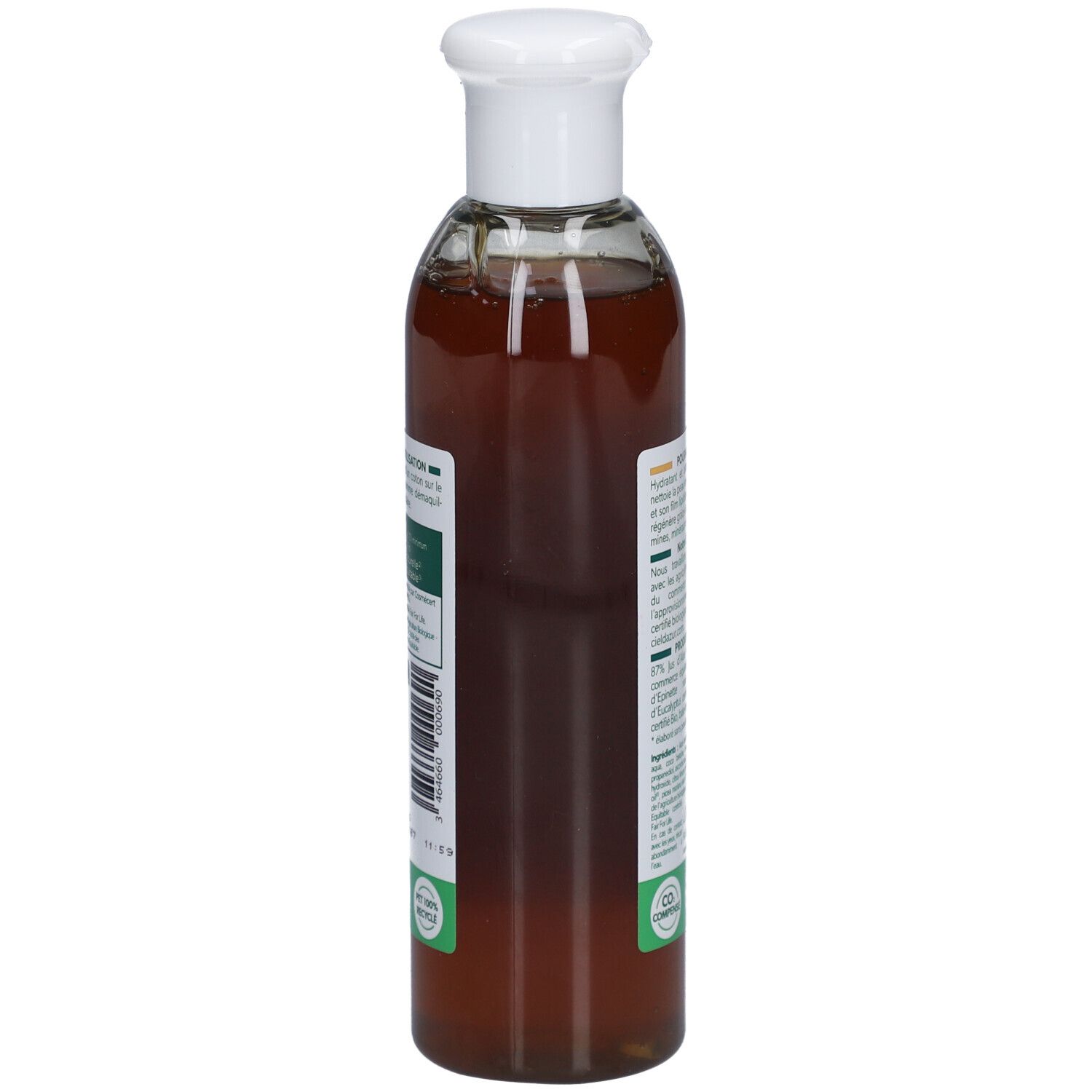Zijaanzicht van de fles. Etiket met productinformatie en barcode. Transparante vloeistof zichtbaar.