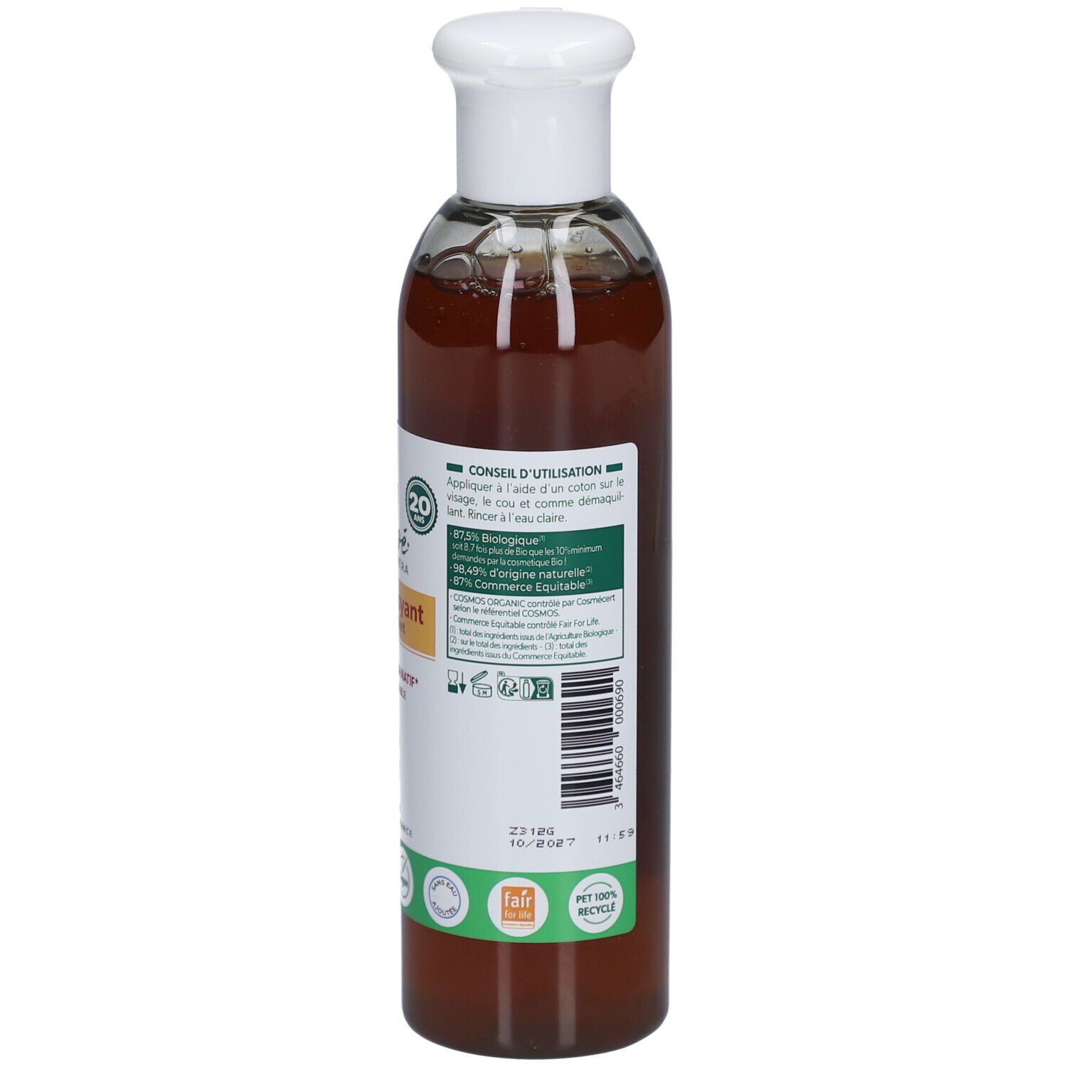 Achterkant van de fles. Etiket met productinformatie, ingrediënten en bio-labels. Transparante vloeistof zichtbaar.