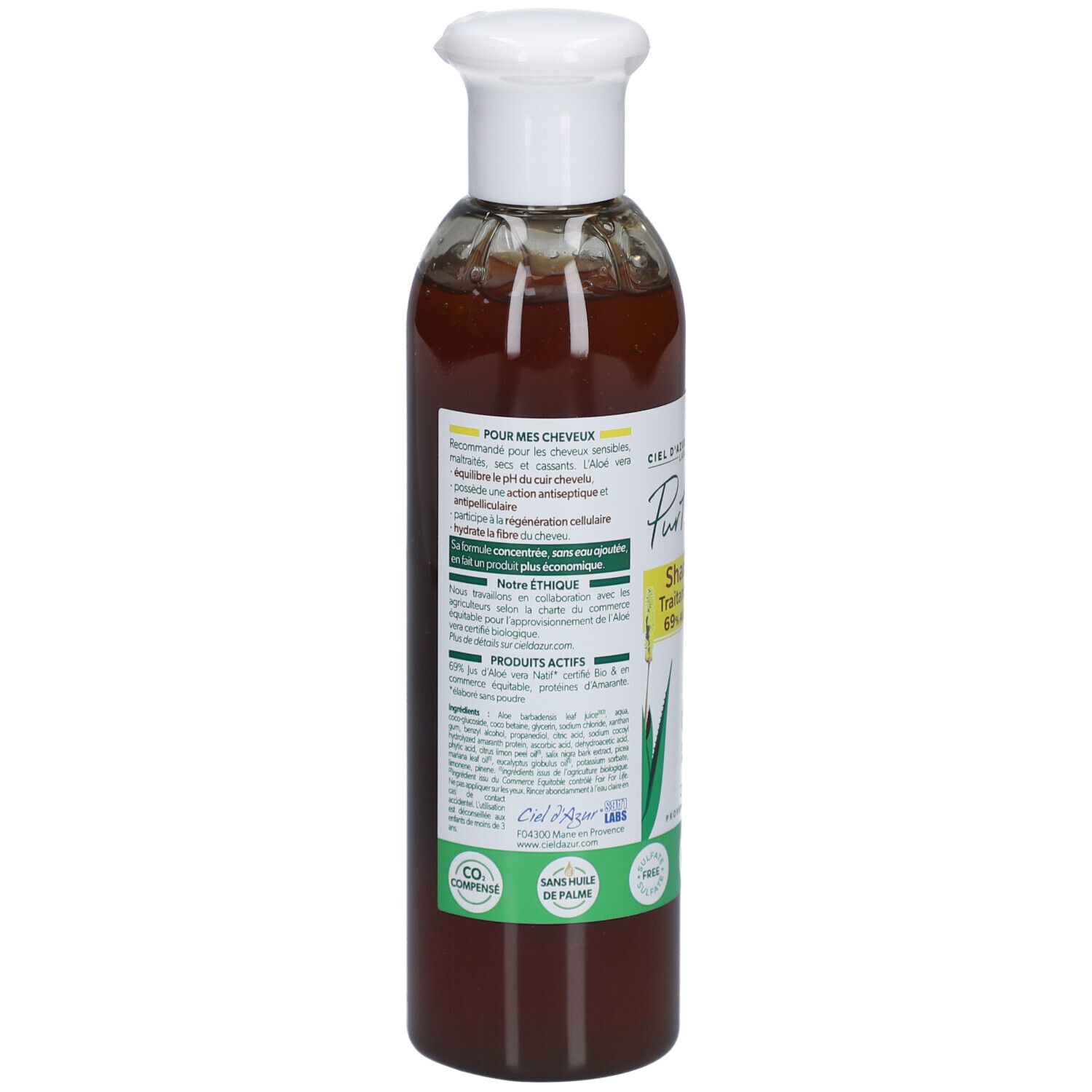 Dos du flacon CIEL D'AZUR PurAloé Shampooing Concentré. Texte et logos sur étiquette blanche. Autocollant vert avec texte.