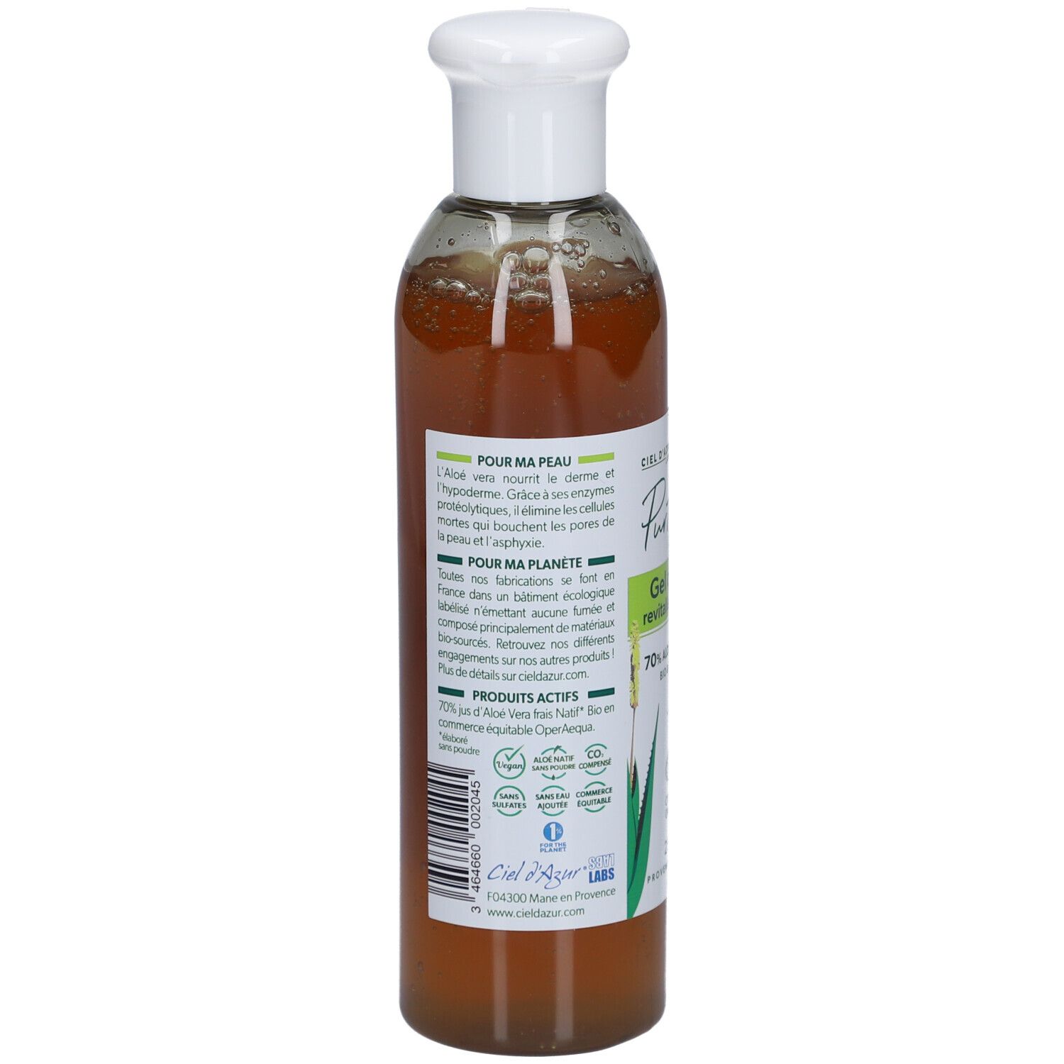 Achterkant van de fles. Tekst over ingrediënten en duurzaamheid. Bio-certificeringen en aloë vera-logo.