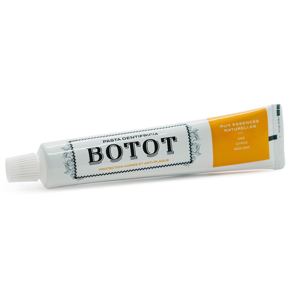 Tube de dentifrice blanc et jaune. Inscription BOTOT, texte en français. Avec bouchon à vis.