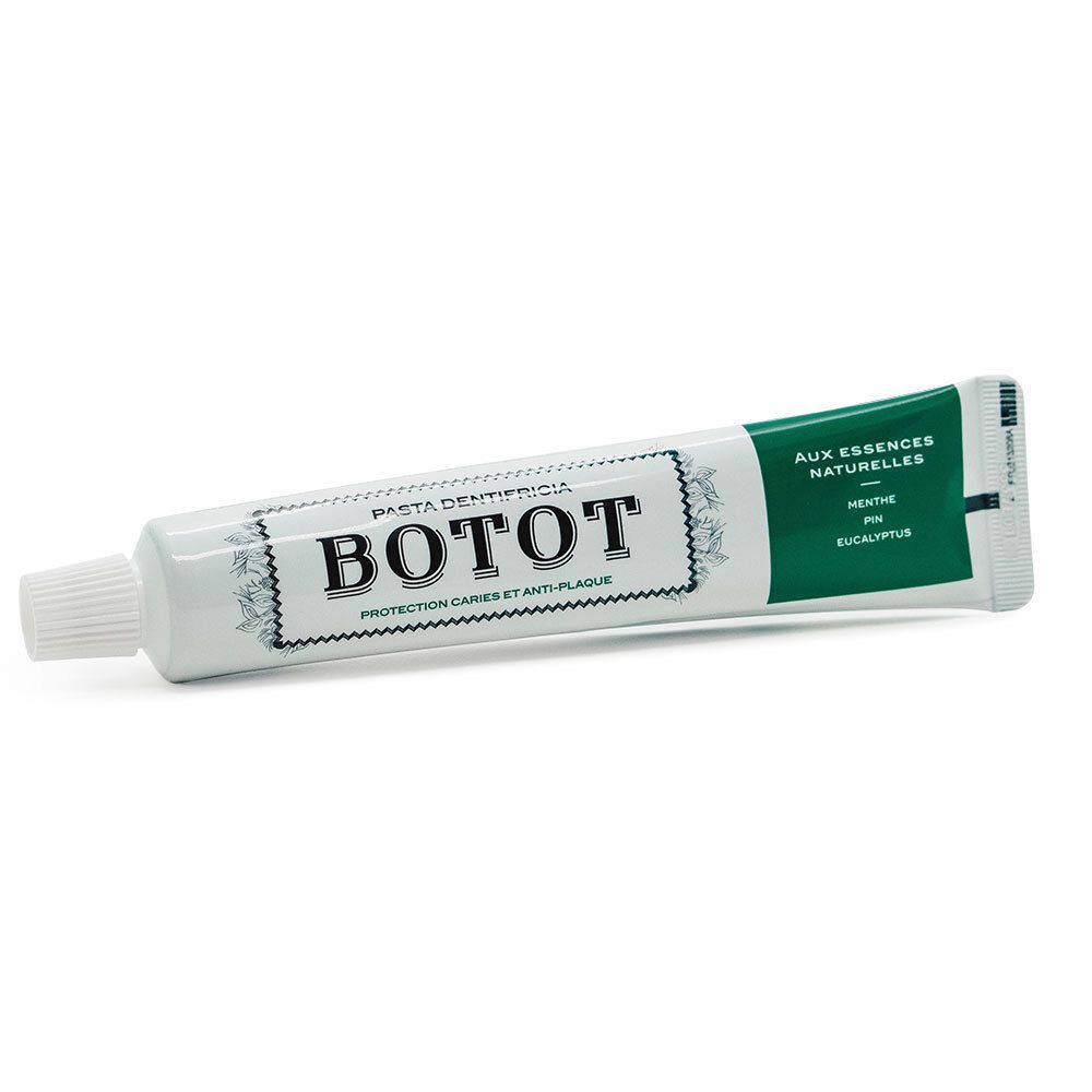 Tube de dentifrice blanche et verte. Inscription BOTOT, Pasta Dentifricia, protection contre les caries et la plaque.