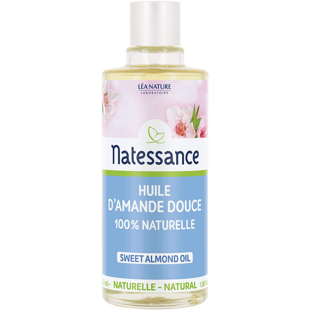 Flacon d'huile d'amande douce Natessance. Étiquette avec informations produit et motif floral. 100% naturel.