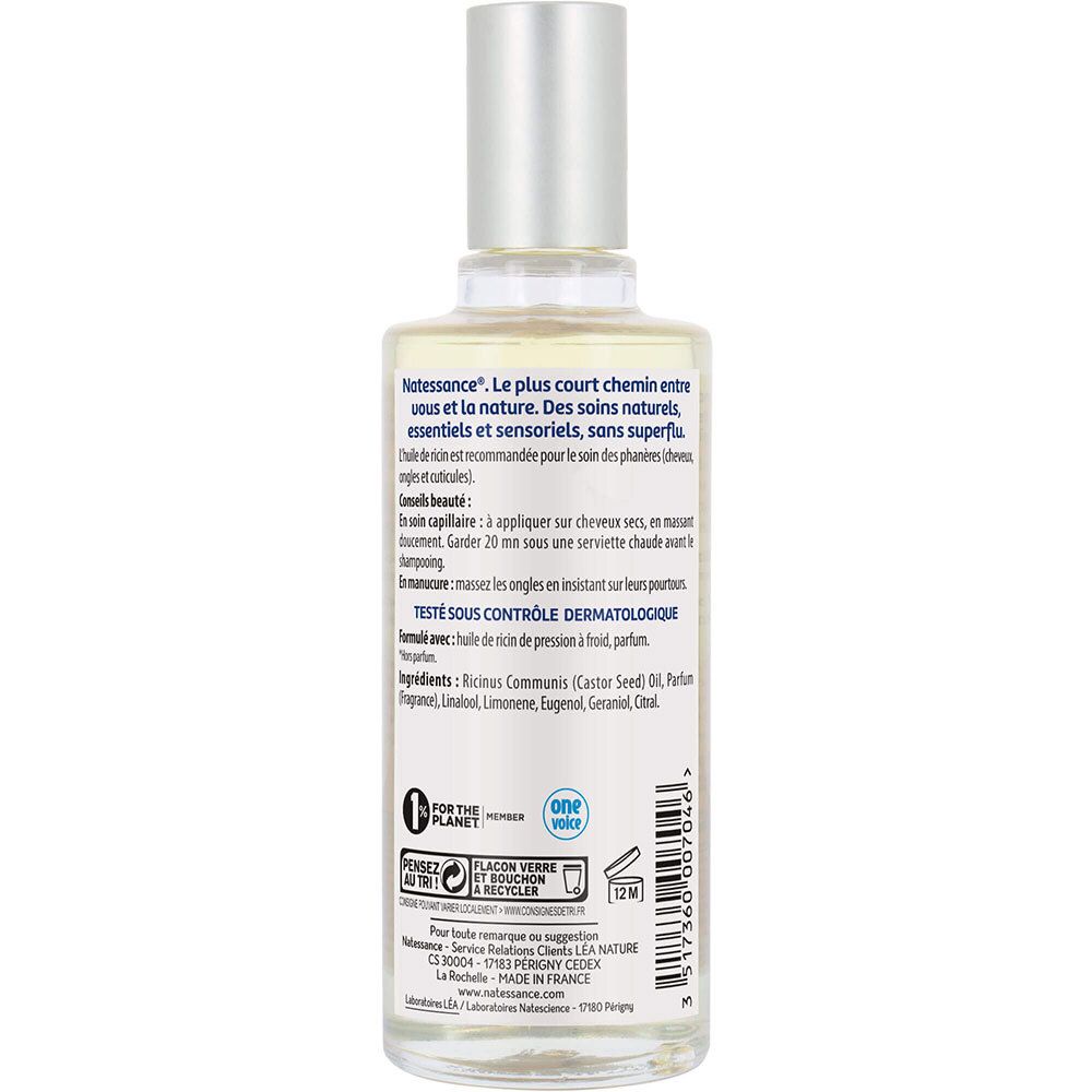 Achterkant van de oliefles. Tekst: informatie, ingrediënten, dermatologisch getest, fles recyclebaar.