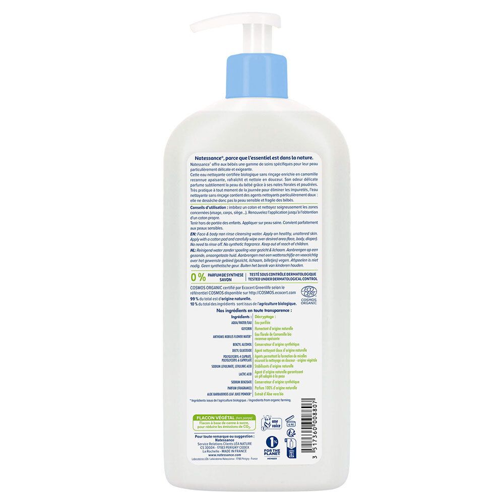 Achterkant van de witte fles. Meertalige tekst. Bevat informatie over ingrediënten en certificeringen.