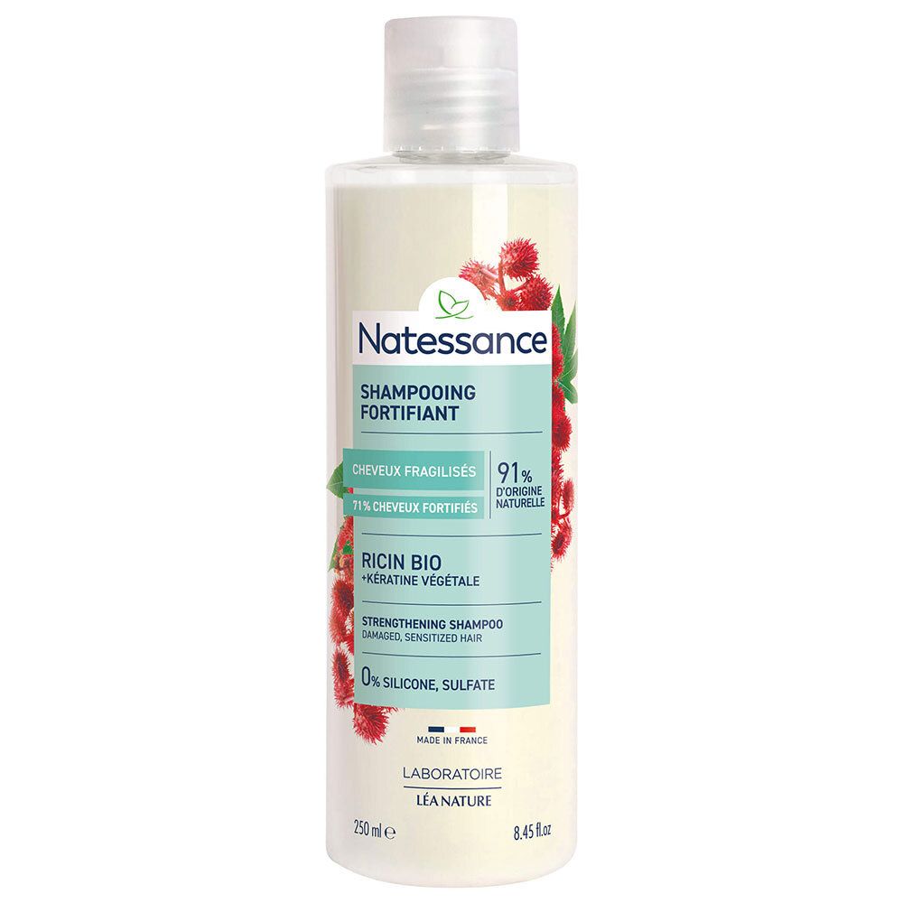 Shampoo fles met etiket. Tekst: Natessance, Shampooing Fortifiant, Ricin Bio, Keratine Végétale. 0% siliconen, sulfaat.