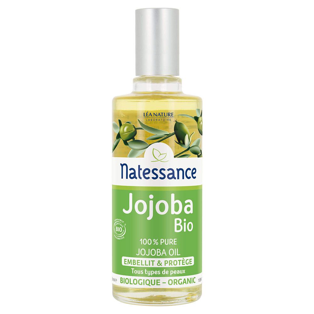 Transparante glazen fles met zilveren dop. Etiket met "Natessance Jojoba Bio" en bio-logo. Olijven illustratie.