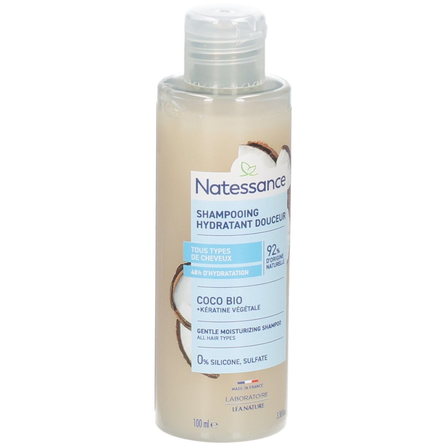 Shampoo fles met kokosnoot illustratie. Tekst: Natessance, Shampooing hydratant douceur, Coco Bio, 0% silicone, sulfaat.
