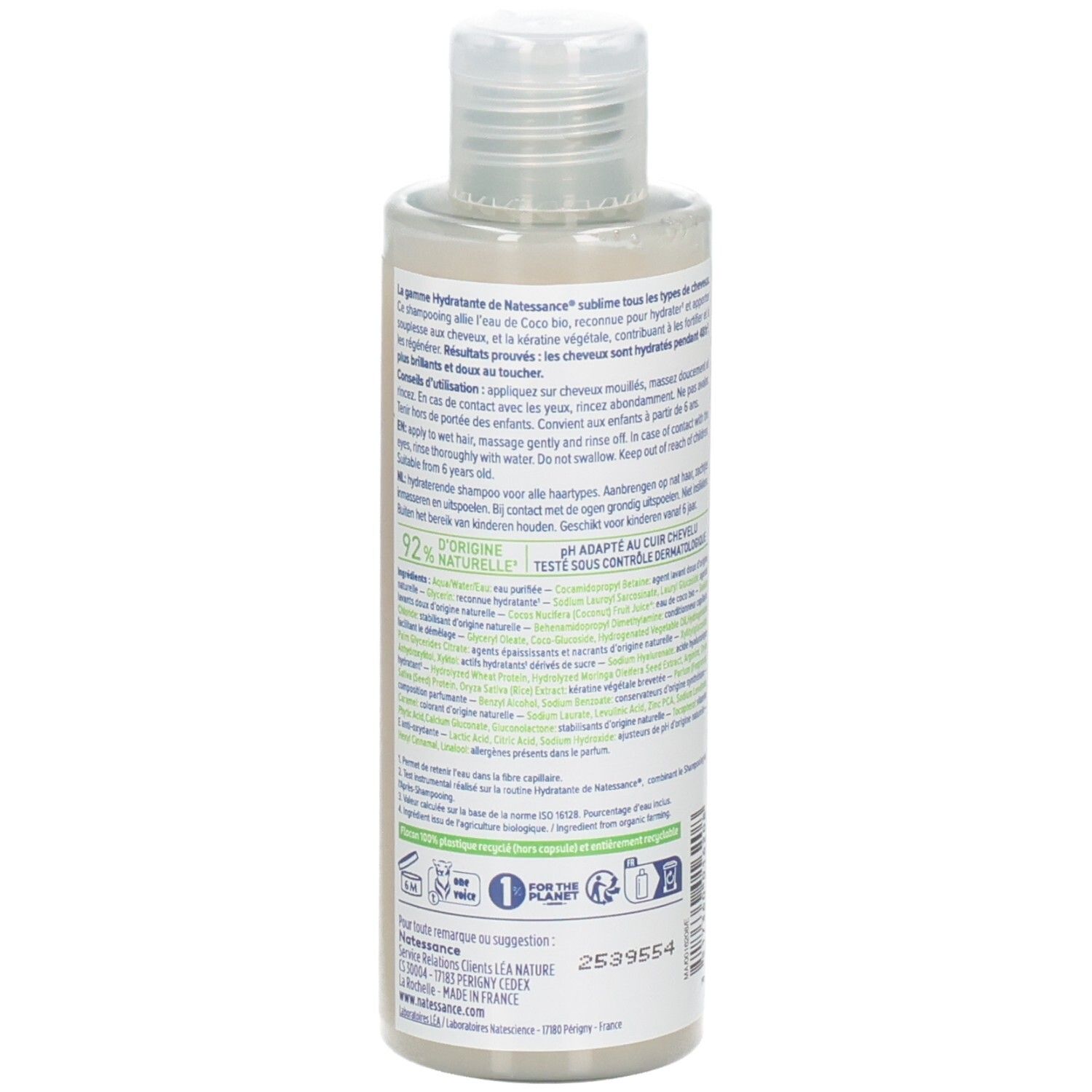 Achterkant van de shampoo fles. Tekst: gebruiksaanwijzing, ingrediënten, fabrikant. Logo's en certificeringen.