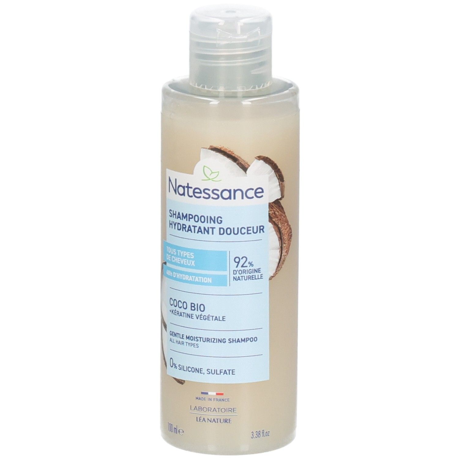 Shampoo fles met kokosnoot illustratie. Tekst: Natessance, Shampooing hydratant douceur, Coco Bio, 0% silicone, sulfaat.