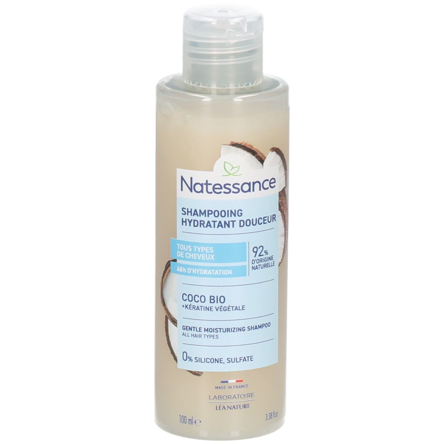 Shampoo fles met kokosnoot illustratie. Tekst: Natessance, Shampooing hydratant douceur, Coco Bio, 0% silicone, sulfaat.