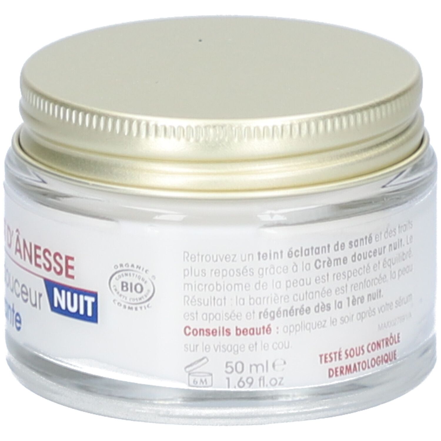 Crème en pot de verre avec couvercle doré. Inscription: SO'BiO étic, Mon Lait d'Ânesse, Crème douceur régénérante, Nuit. Certification bio.