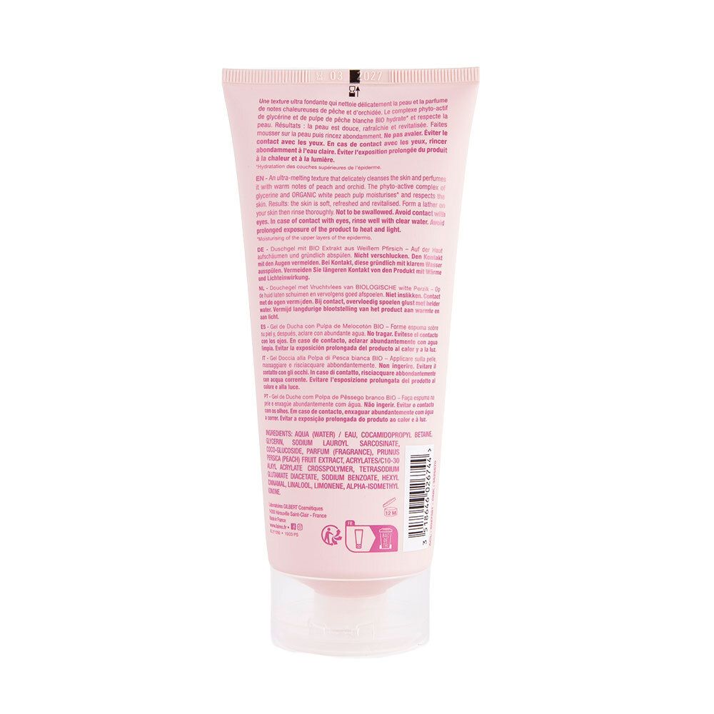 Achterkant van een roze tube met productinformatie en ingrediënten. Transparante dop.