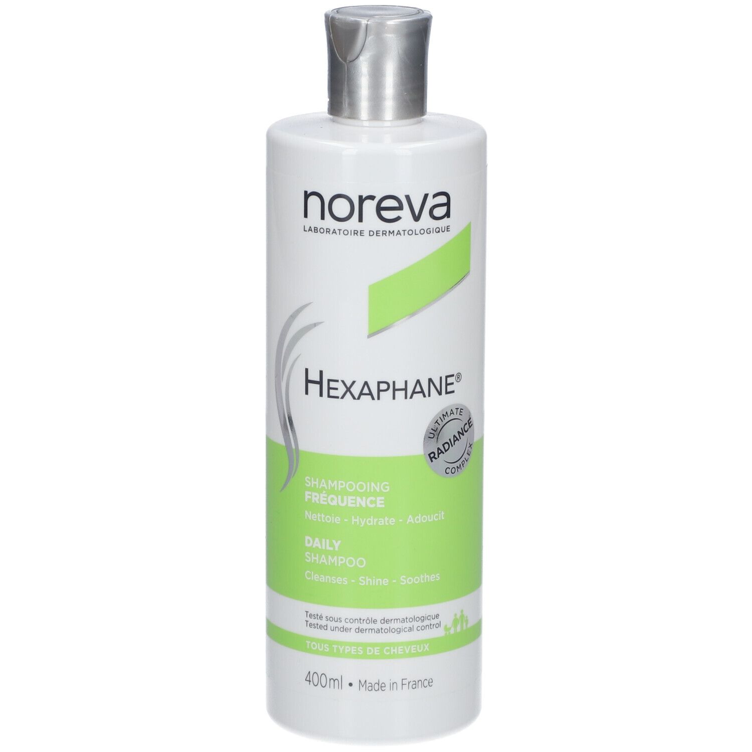 Flacon blanc avec étiquette verte. Inscriptions : noreva, HEXAPHANE®, Shampooing fréquence, Daily Shampoo. 400ml.