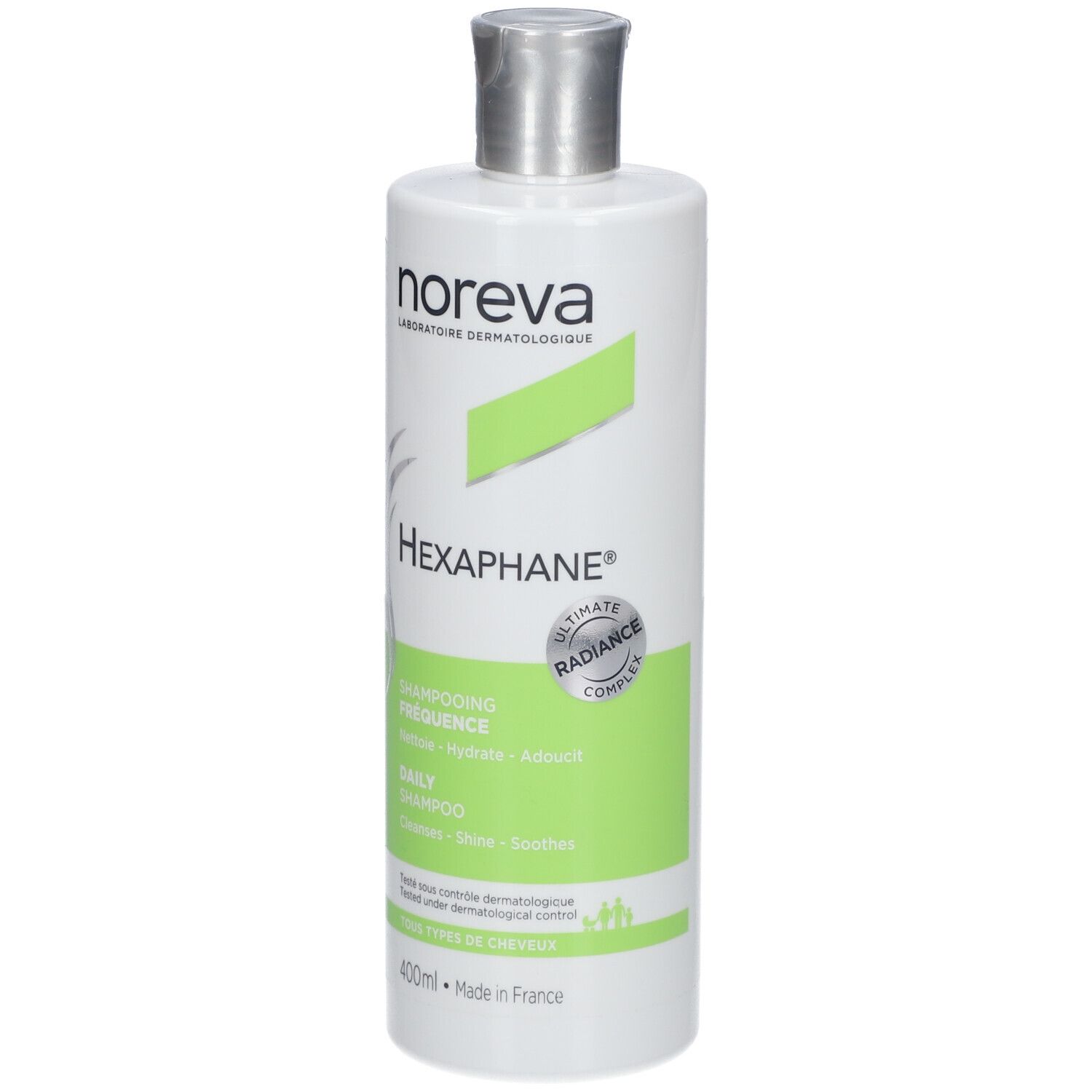 Flacon blanc avec étiquette verte. Inscriptions : noreva, HEXAPHANE®, Shampooing fréquence, Daily Shampoo. 400ml.