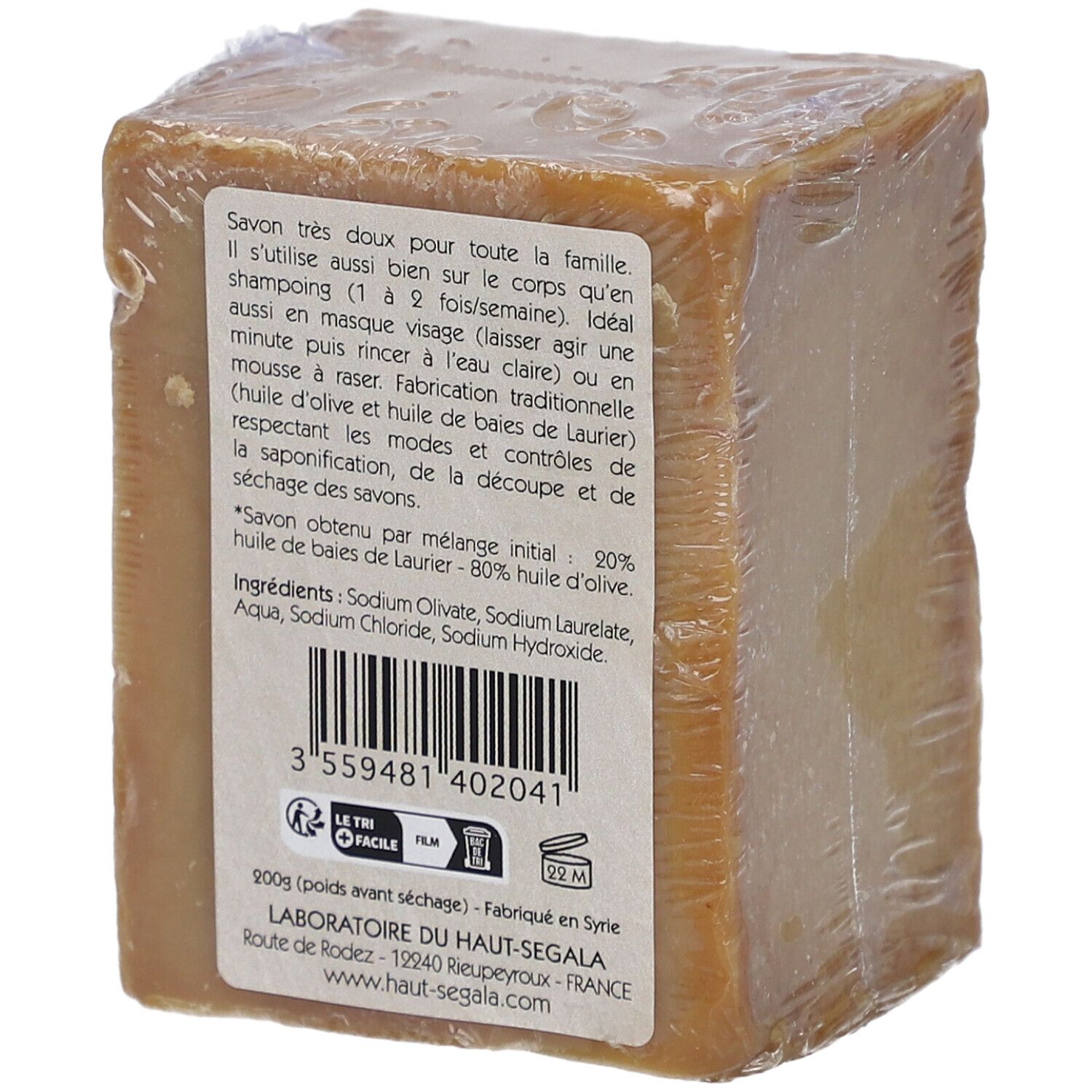 Kubusvormig zeepblok in folie. Achterkant met tekst, barcode en merk Laboratoire du Haut-Ségala.