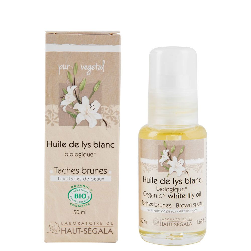 Olie fles en doos. Opschrift: Huile de lys blanc, Taches brunes. Bio-certificering.