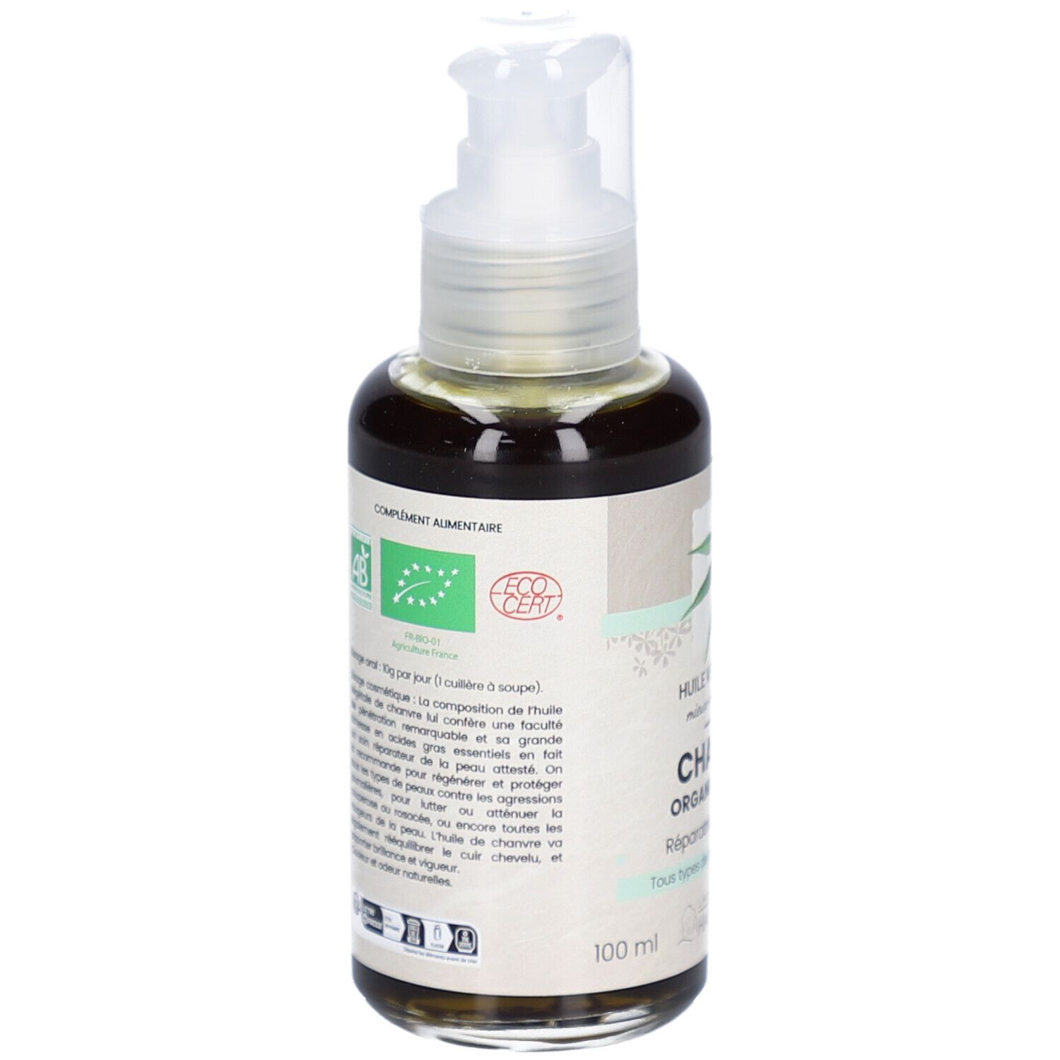 Achterkant van de bruine glazen fles met pomp. Etiket met tekst en biologische labels. Merk: HAUT-SEGALA.